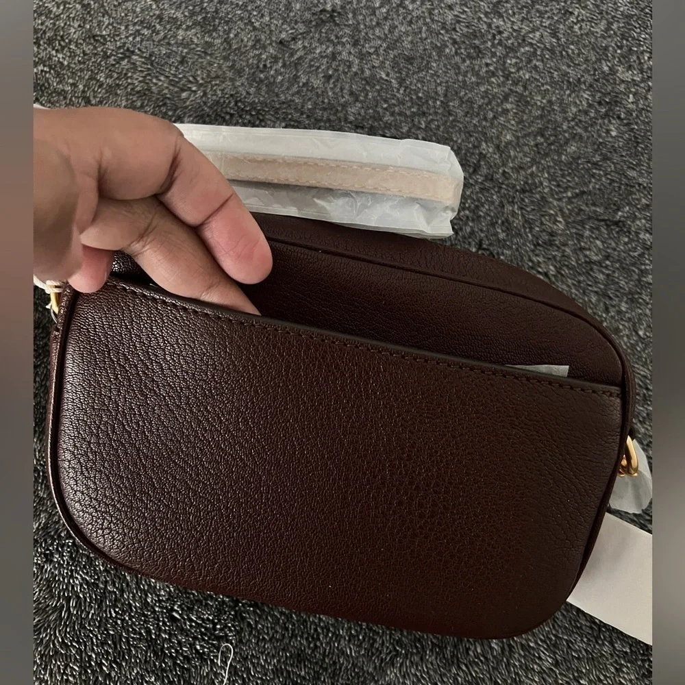 TORY BURCH • TEXTURED MCGRAW LEATHER CAMERA BAG- color WINE